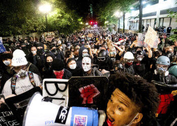 Black Lives Matter protesters march through Portland, Oregon, after rallying at the Mark O. Hatfield United States Courthouse on Sunday, Aug. 2, 2020. Protests, rallies, sit-ins, marches and disruptions are hallmarks of American history. Photo credit: Noah Berger, The Associated Press