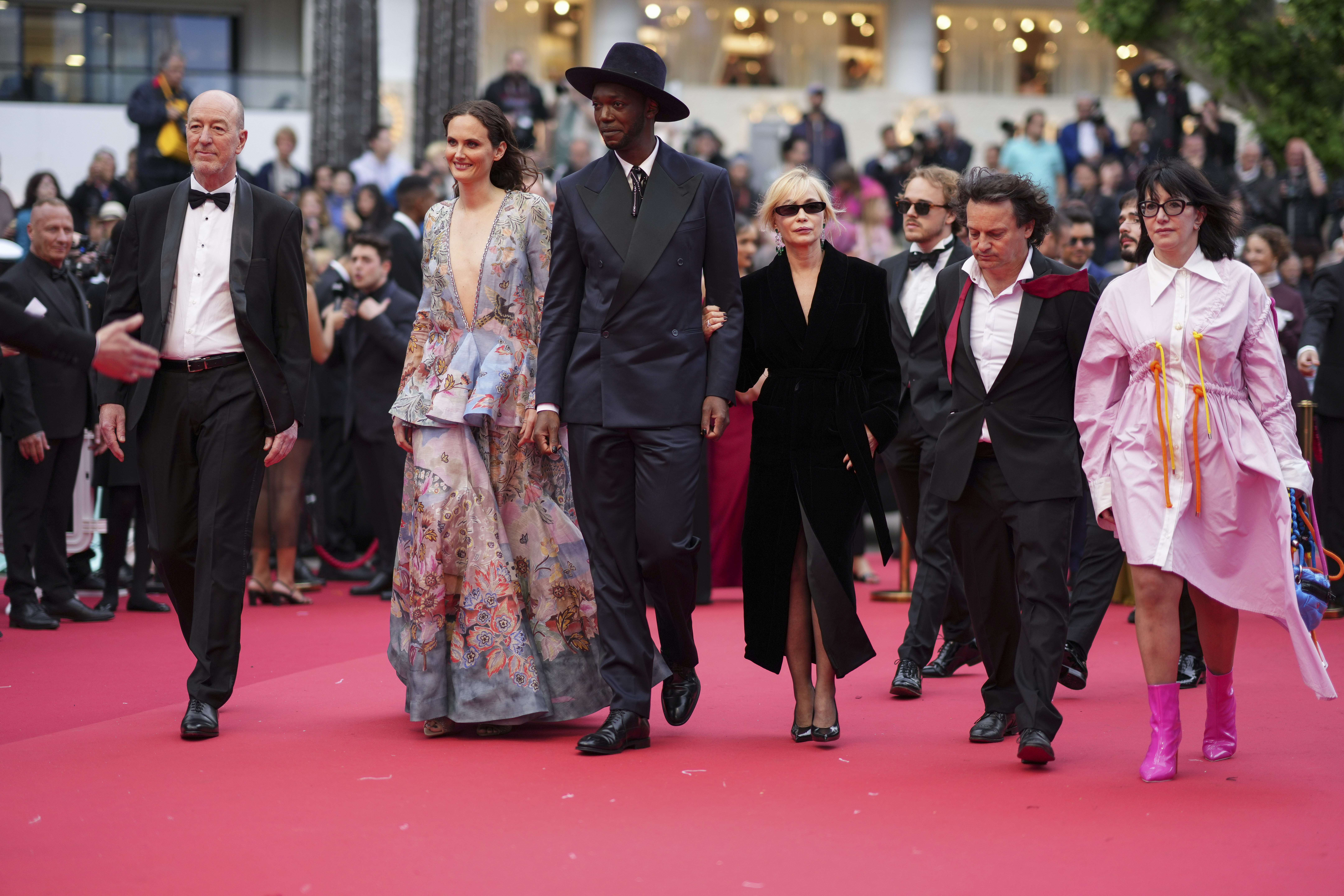 Camera d'Or jury members from left: Pascal Buron, Zoe Wittock, Baloji, Emmanuelle Beart, Gilles Porte and Nathalie Chifflet pose for photographers upon arrival at the awards ceremony and the premiere of the film "The Second Act" during the 77th international film festival, Cannes, southern France, Tuesday, May 14, 2024. Photo credit: Scott A Garfitt, Invision/The Associated Press