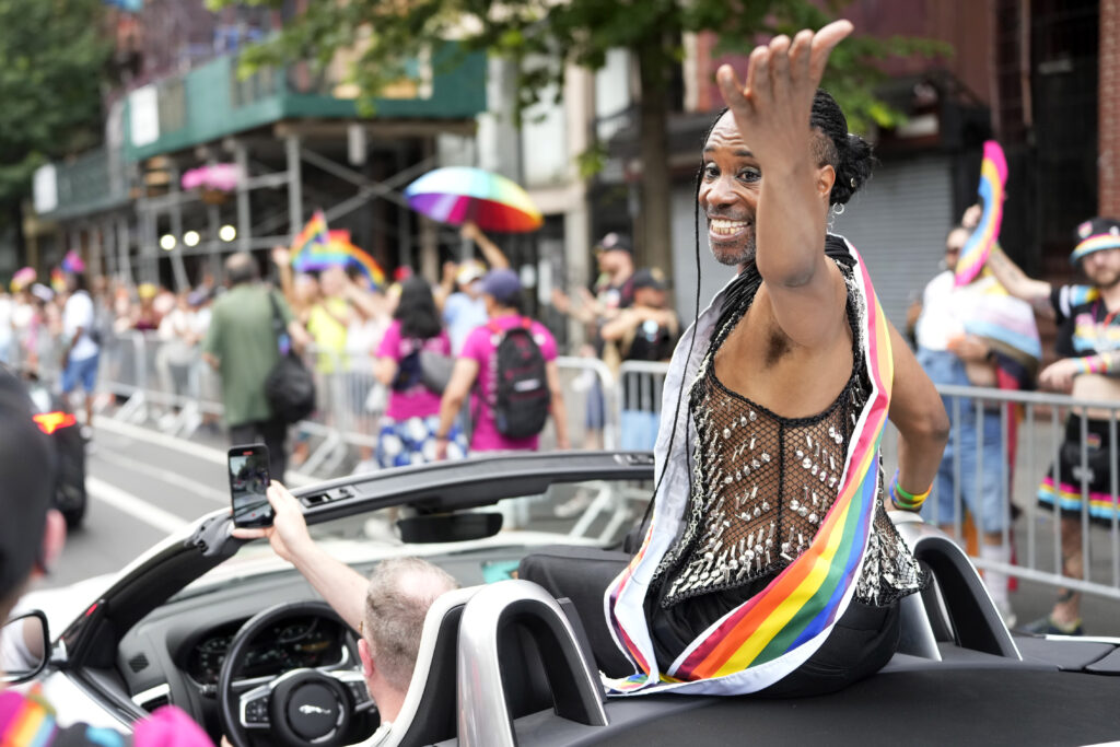 Grand Marshal Billy Porter rides in a convertible in the NYC Pride March, Sunday, June 25, 2023, in New York. Photo credit: Charles Sykes, Invision/The Associated Press