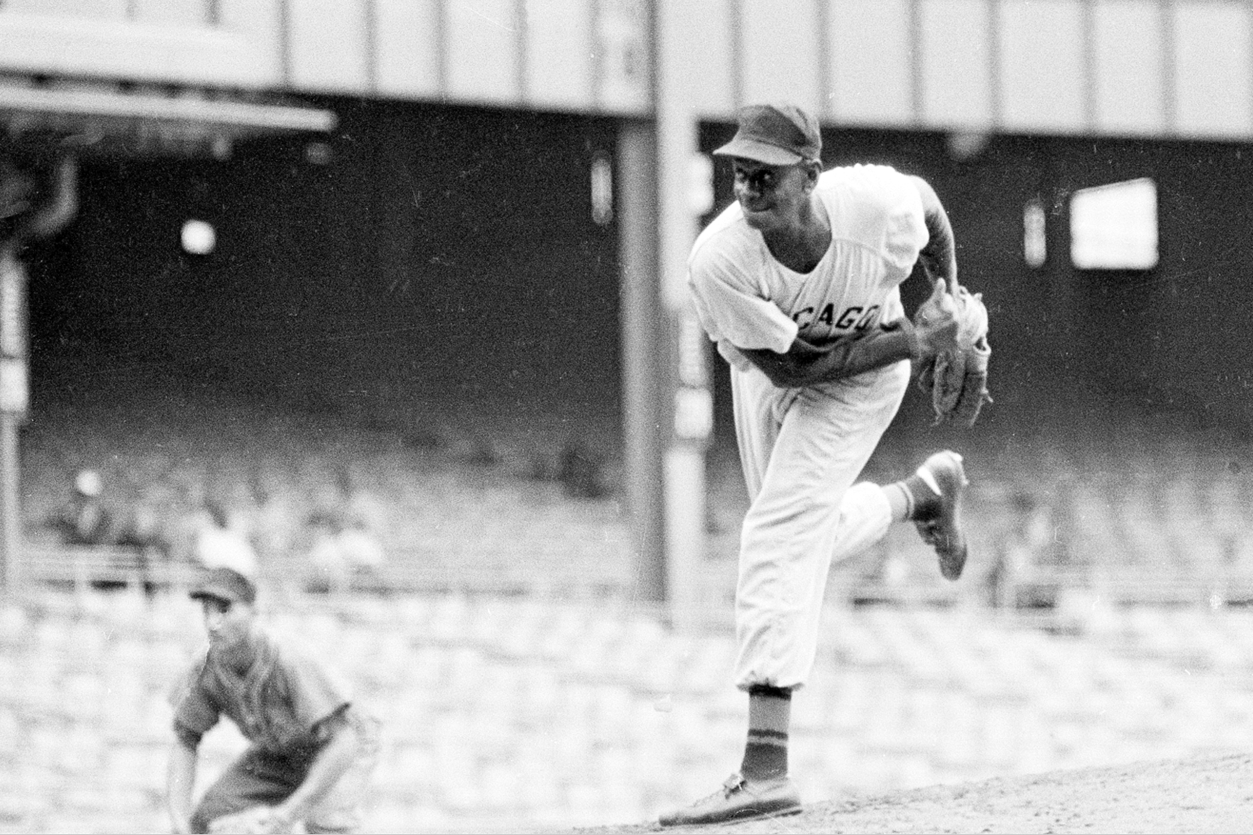 In this Aug. 17, 1961, file photo, pitcher Leroy "Satchel" Paige is shown in action during the Negro American League 29th East-West All Star game at New York's Yankee Stadium. Photo credit: Harry Harris, The Associated Press