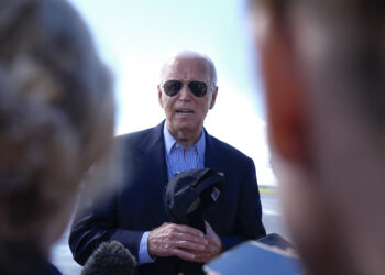 President Joe Biden speaks to reporters on the tarmac before departing at Dane County Regional Airport in Madison, Wisconsin, following a campaign visit on Friday, July 5, 2024. Photo credit: Manuel Balce Ceneta, The Associated Press