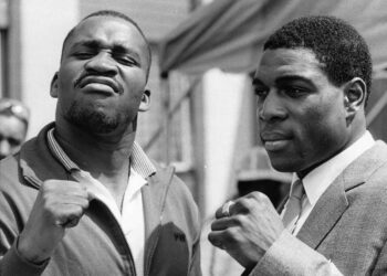 American World Boxing Association heavyweight champion Tim Witherspoon, left, with Britain's Frank Bruno during a press reception in Hornchurch, Essex, on July 10, 1986, days before the two fighters were to meet at Wembley Arena in London. Photo credit: Dave Caulkin, The Associated Press