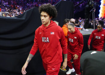Brittney Griner, left, Diana Taurasi, and Chelsea Gray, of Team USA, walk on the court prior to a WNBA All-Star basketball game against Team WNBA, Saturday, July 20, 2024, in Phoenix. Photo credit: Ross D. Franklin, The Associated Press