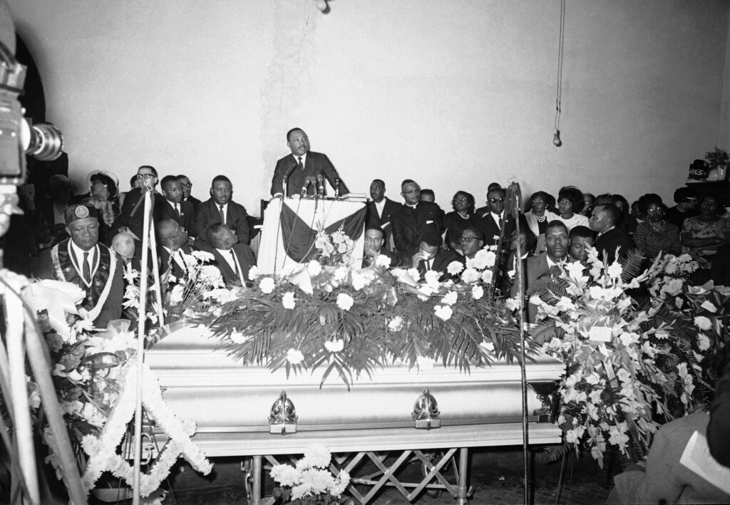 Dr. Martin Luther King Jr., as he preaches the funeral in Marion, Alabama, on March, 1965 of Jimmie Lee Jackson, slain during a racial demonstration. Photo credit: The Associated Press