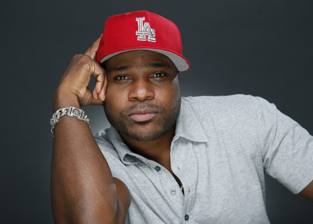 Late actor and musician Malcolm-Jamal Warner poses for a portrait in Los Angeles on Oct. 8, 2015. Photo credit: Danny Moloshok, Invision/The Associated Press