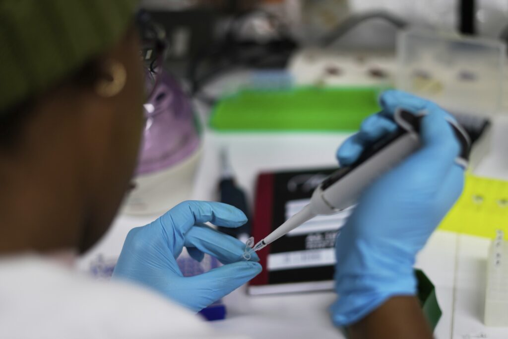 Laboratory technician Nozipho Mlotshwa works on samples at the Wits Laboratory Antiviral Gene Therapy Research Unit, at University of the Witwatersrand Medical School, in Johannesburg, South Africa, Thursday, May 22, 2025. Photo credit: Themba Hadebe, The Associated Press