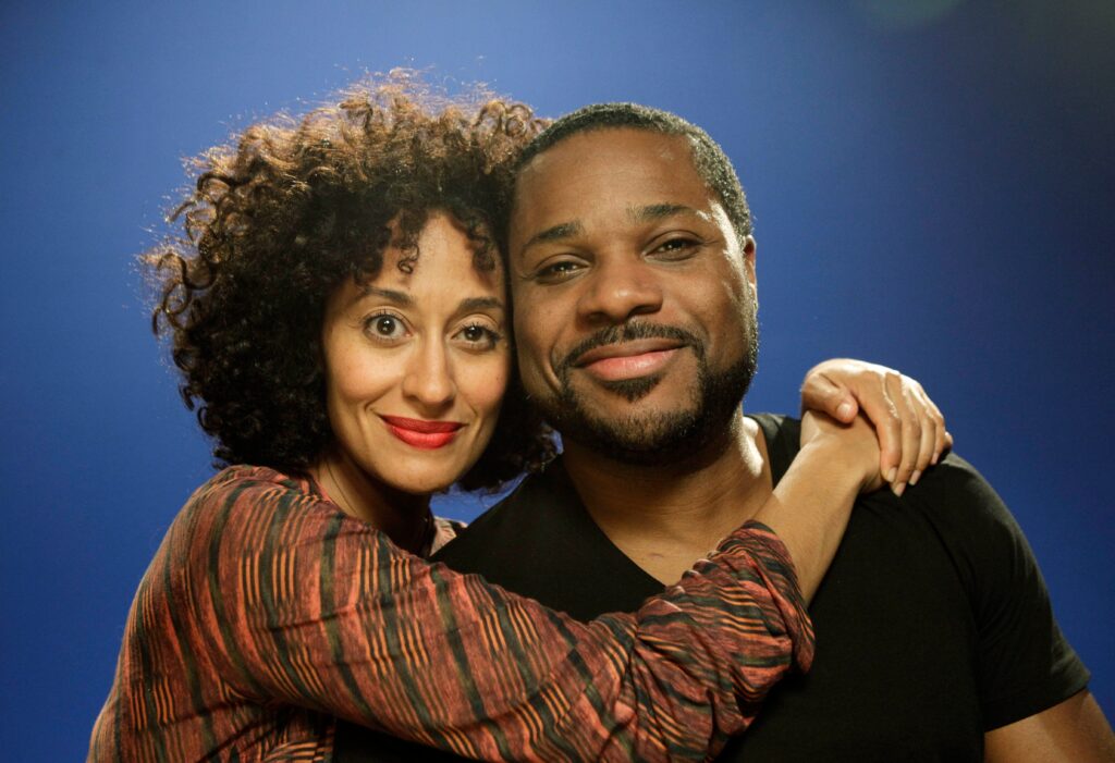 In this Tuesday, Oct. 11, 2011 photo, Tracee Ellis Ross, left, and the late Malcolm-Jamal Warner, who portrayed a married couple in the BET TV comedy series, "Reed Between the Lines," pose for a photograph in New York. Photo credit: Kathy Willens, The Associated Press