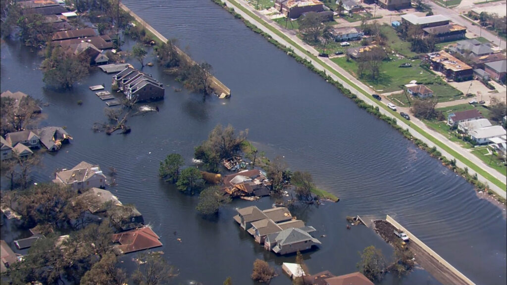 An aerial view of a broken levee after in the aftermath of Hurricane Katrina in New Orleans in 2005, as shown in the NatGeo documentary "Hurricane Katrina: Race Against Time." .Photo credit: Pond5