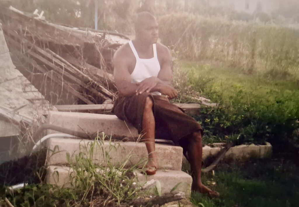 Shelton Alexander at the remains of his home in New Orleans that was destroyed by Hurricane Katrina. Photo courtesy Shelton Alexander