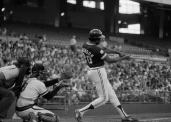 Cleveland Indians player-manager Frank Robinson slugs his first home run in his first at bat against the California Angles on July 7,1976, in Anaheim, California. Photo credit: The Associated Press