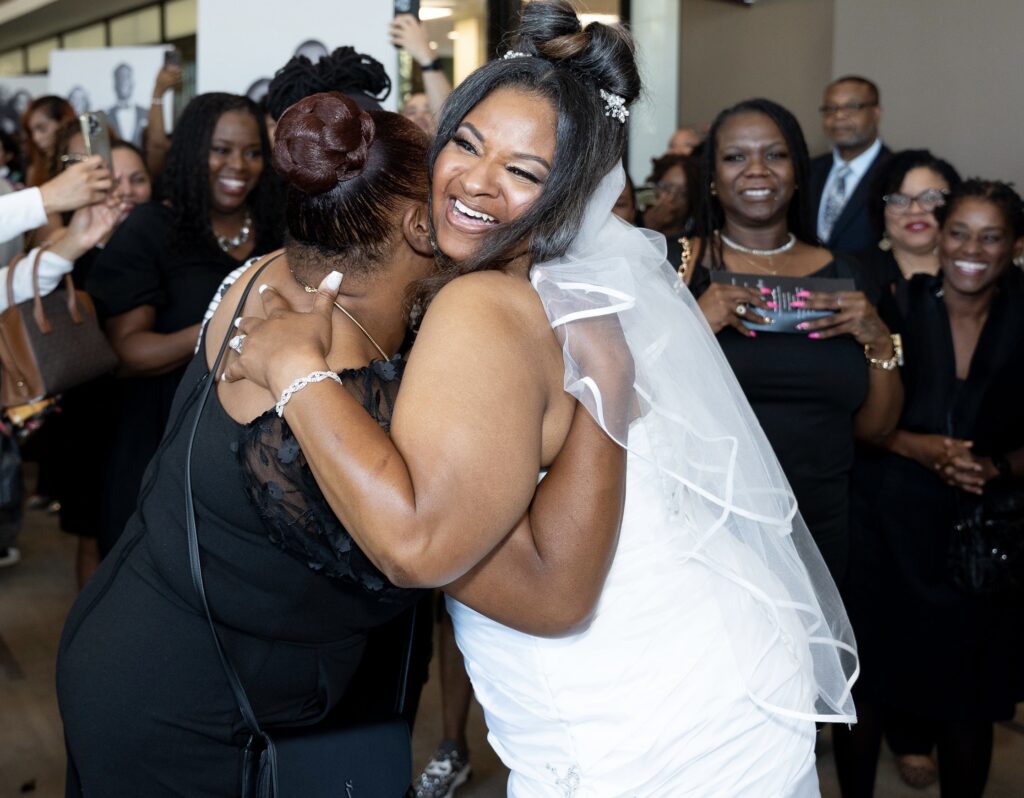 A bride celebrates at the Grand Wedding at Concord Church, Dallas, on Saturday, Sept. 20, 2025. Photo credit: Concord Technologies