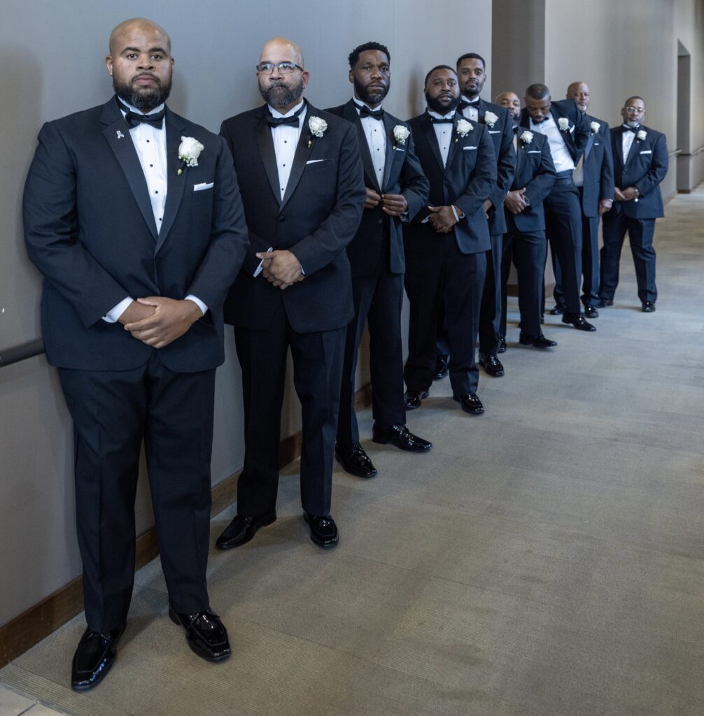 Grooms line up at the Grand Wedding, Concord Church in Dallas on Saturday, Sept. 20, 2025. Photo credit: Concord Technologies