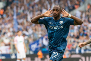 Bochum's Christopher Antwi-Adjei celebrates after scoring the opening goal during the German Bundesliga soccer match between VfL Bochum and FC Augsburg in Bochum, Germany, on May 13, 2023. Photo credit: David Inderlied, dpa via The Associated Press