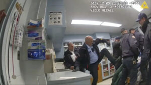 This image provided by the office of the New York State Attorney General shows body camera footage of correction officers beating a handcuffed Robert Brooks at the Marcy Correctional Facility in Oneida County, New York, on Dec. 9, 2024. Photo credit: Office of the New York State Attorney General via The Associated Press