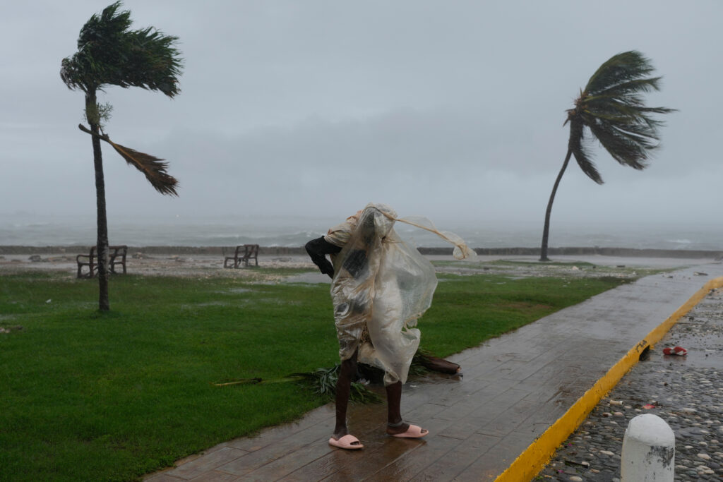 A man walks in Kingston, Jamaica, as Hurricane Melissa approaches on Tuesday, Oct. 28, 2025. Photo credit: Matias Delacroix, The Associated Press