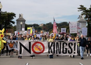 Crowds cross Arlington Memorial Bridge as part of a No Kings protest, Saturday, Oct. 18, 2025, in Washington, D.C. Photo credit: Allison Robbert, The Associated Press