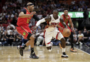 Atlanta Hawks guard Vince Carter (15) defends Miami Heat guard Kendrick Nunn during the second half of an NBA basketball game, Tuesday, Oct. 29, 2019, in Miami. Photo credit: Lynne Sladky, The Associated Press