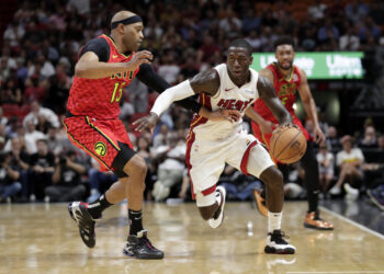Atlanta Hawks guard Vince Carter (15) defends Miami Heat guard Kendrick Nunn during the second half of an NBA basketball game, Tuesday, Oct. 29, 2019, in Miami. Photo credit: Lynne Sladky, The Associated Press