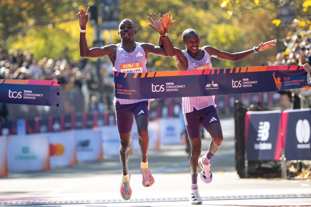 Benson Kipruto and Alexander Mutiso cross the finish line to win first and second place in the men's elite division of the New York City Marathon, Sunday, Nov. 2, 2025, in New York. Photo credit: Angelina Katsanis, The Associated Press