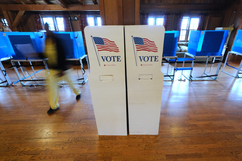 Signs welcomes voters on Tuesday, Nov. 4, 2025, in Del Mar, California. Photo credit: Gregory Bull, The Associated Press