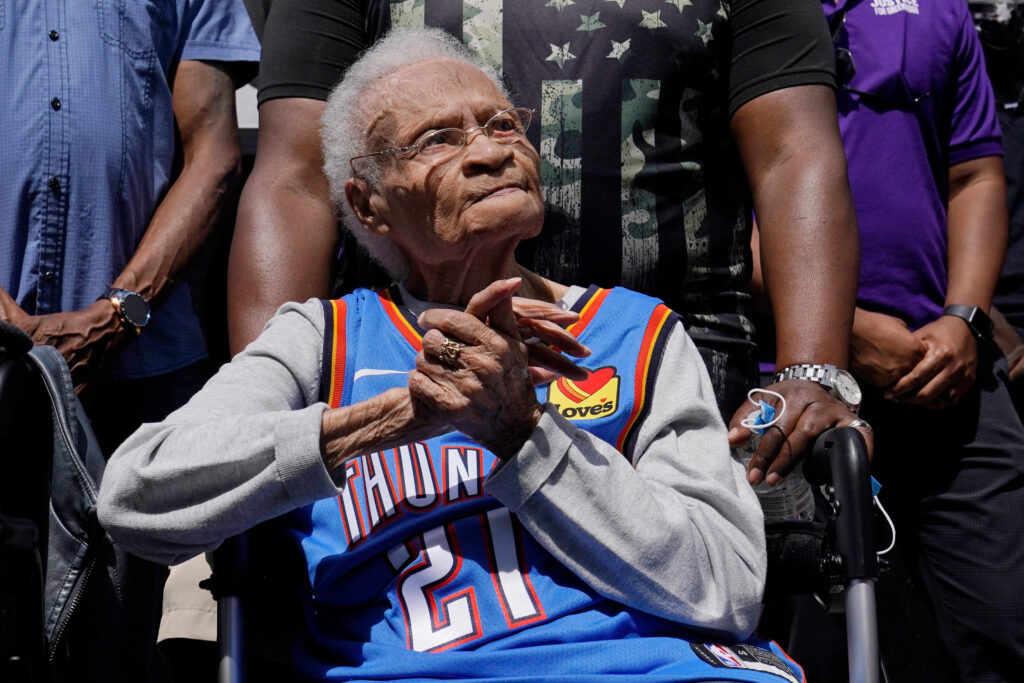 Tulsa Race Massacre survivor Viola Ford Fletcher listens during a rally marking centennial commemorations of a two-day assault by armed white men on Tulsa's prosperous Black community of Greenwood, May 28, 2021, in Tulsa, Oklahoma. Photo credit: Sue Ogrocki, The Associated Press